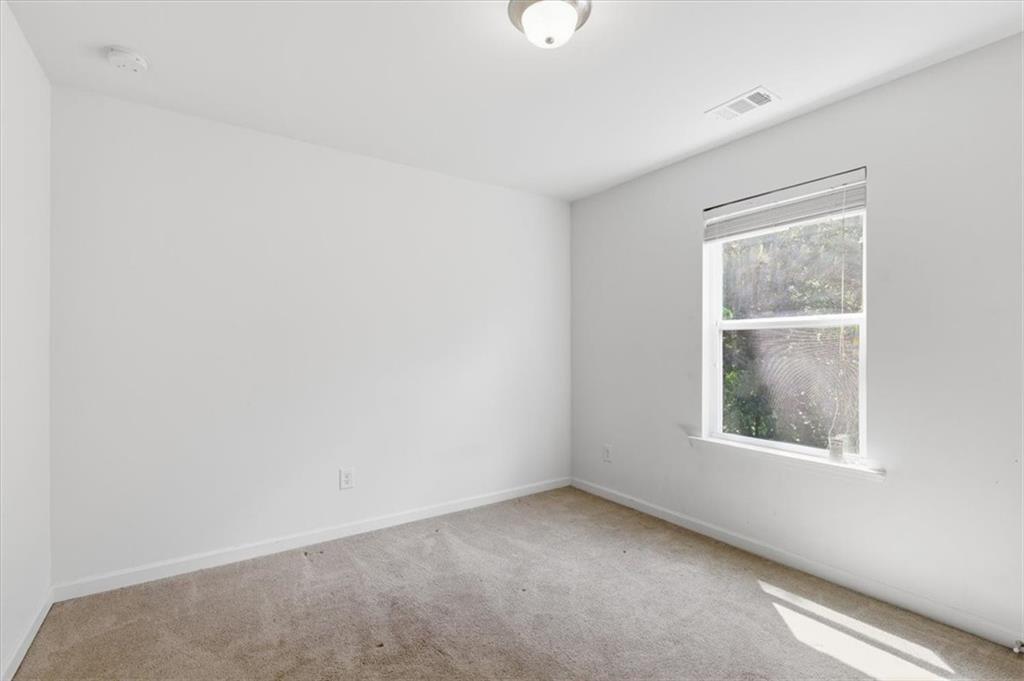 5064 Longview Walk Decatur, GA 30035 - Photo 29 of 30 an empty room with a window