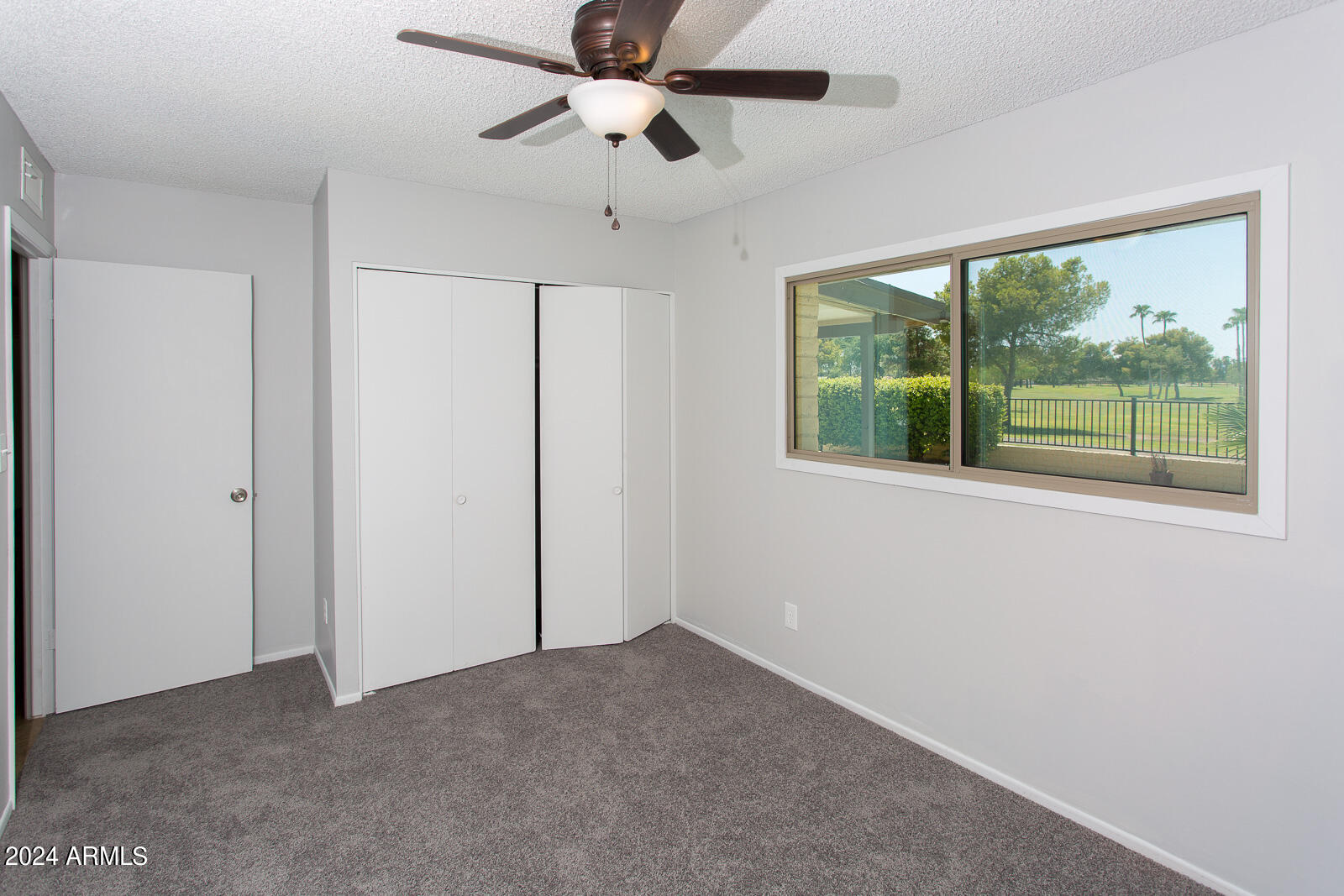 7232 South La Rosa Drive Tempe, AZ 85283 - Photo 11 of 12 a view of an empty room with a window