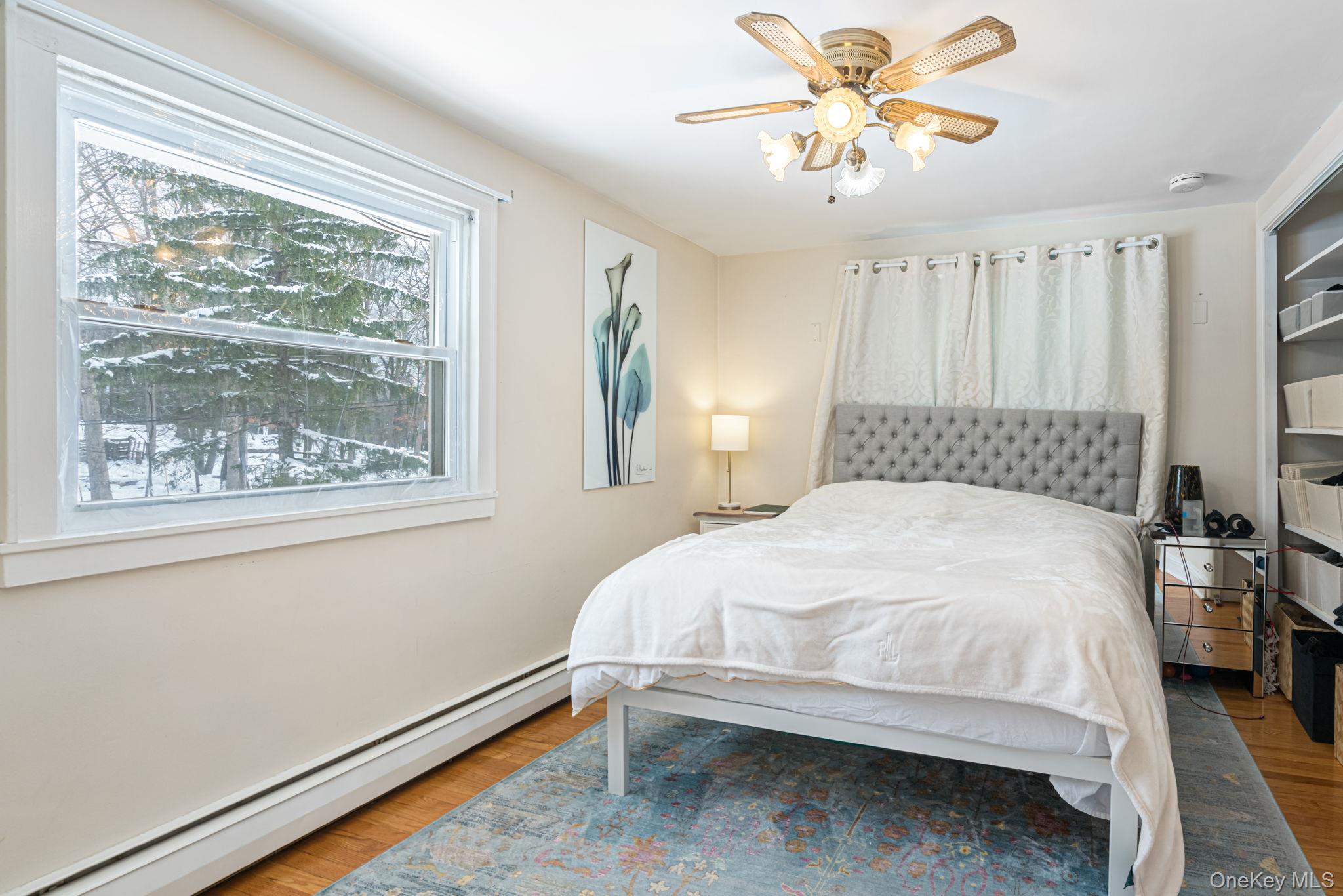 98 Ludlam Road Monroe, NY 10950 - Photo 20 of 21 a bedroom with a bed and a window