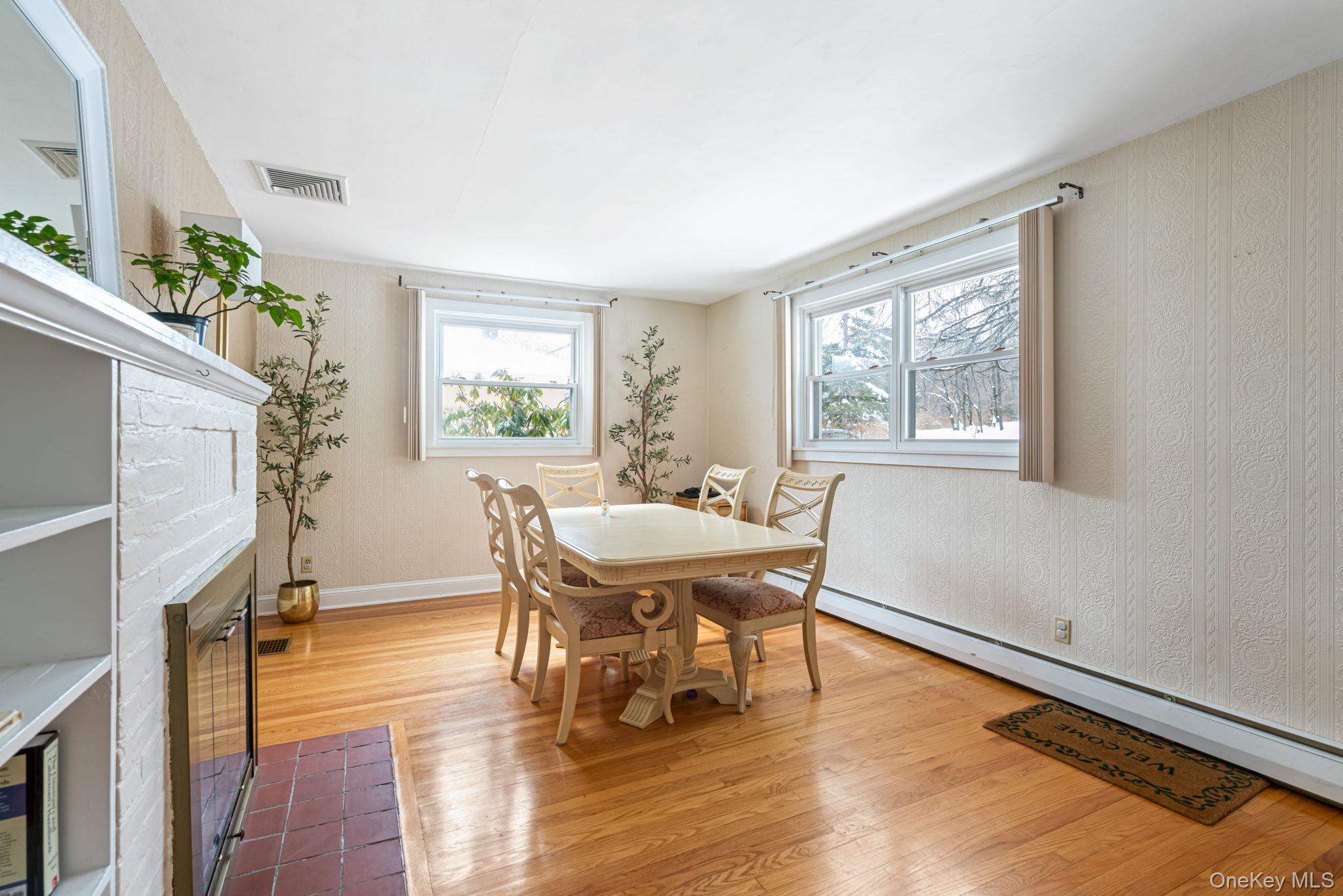 98 Ludlam Road Monroe, NY 10950 - Photo 6 of 21 a view of a dining room with furniture window and wooden floor