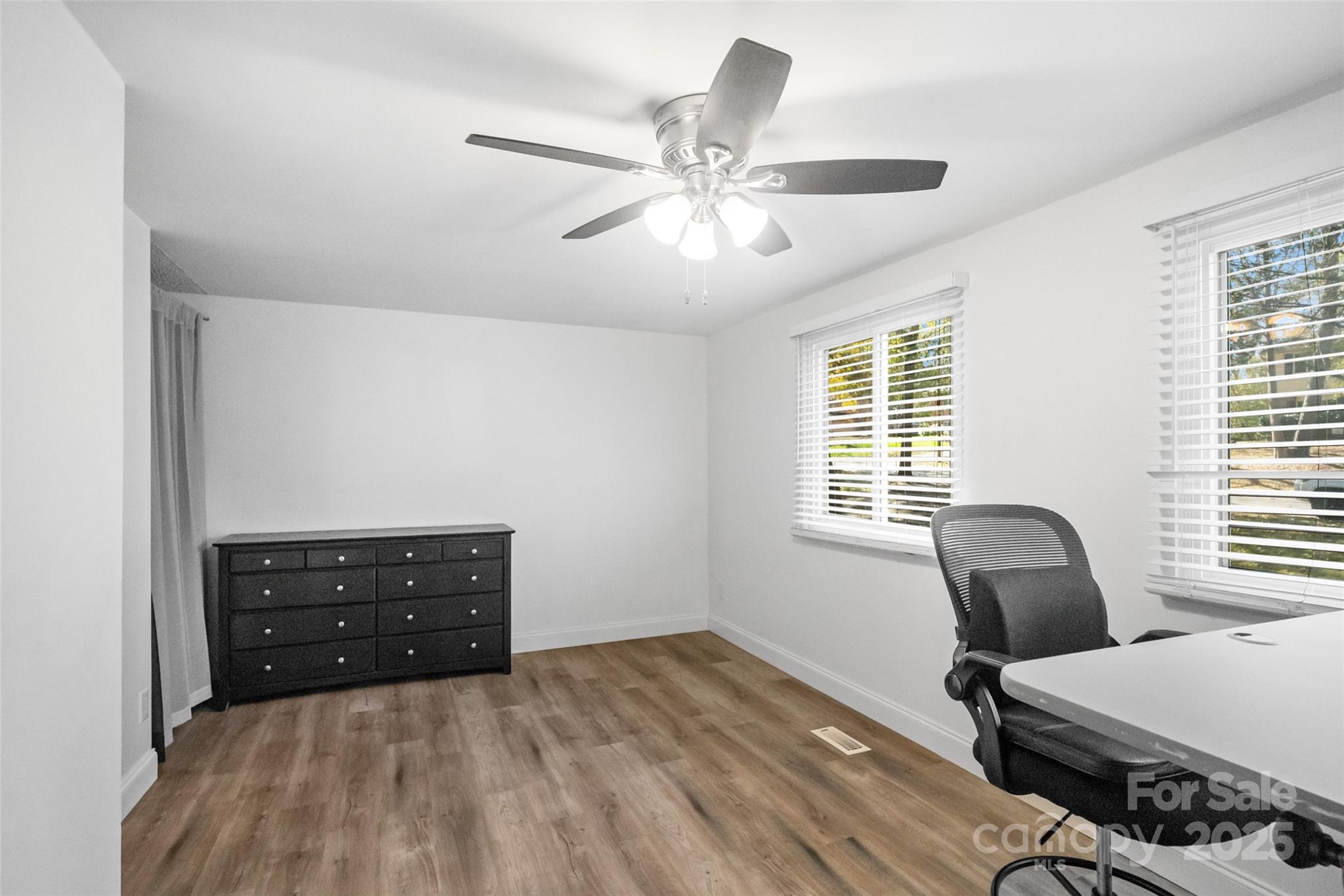 5709 Shadow Creek Road Charlotte, NC 28226 - Photo 19 of 39 a bedroom with a bed and a window