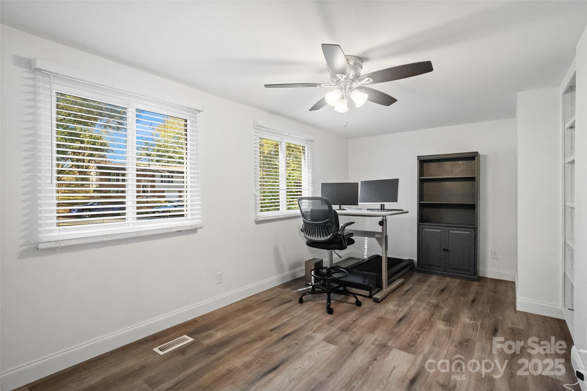 5709 Shadow Creek Road Charlotte, NC 28226 - Photo 20 of 39 a view of a workspace with furniture and a window