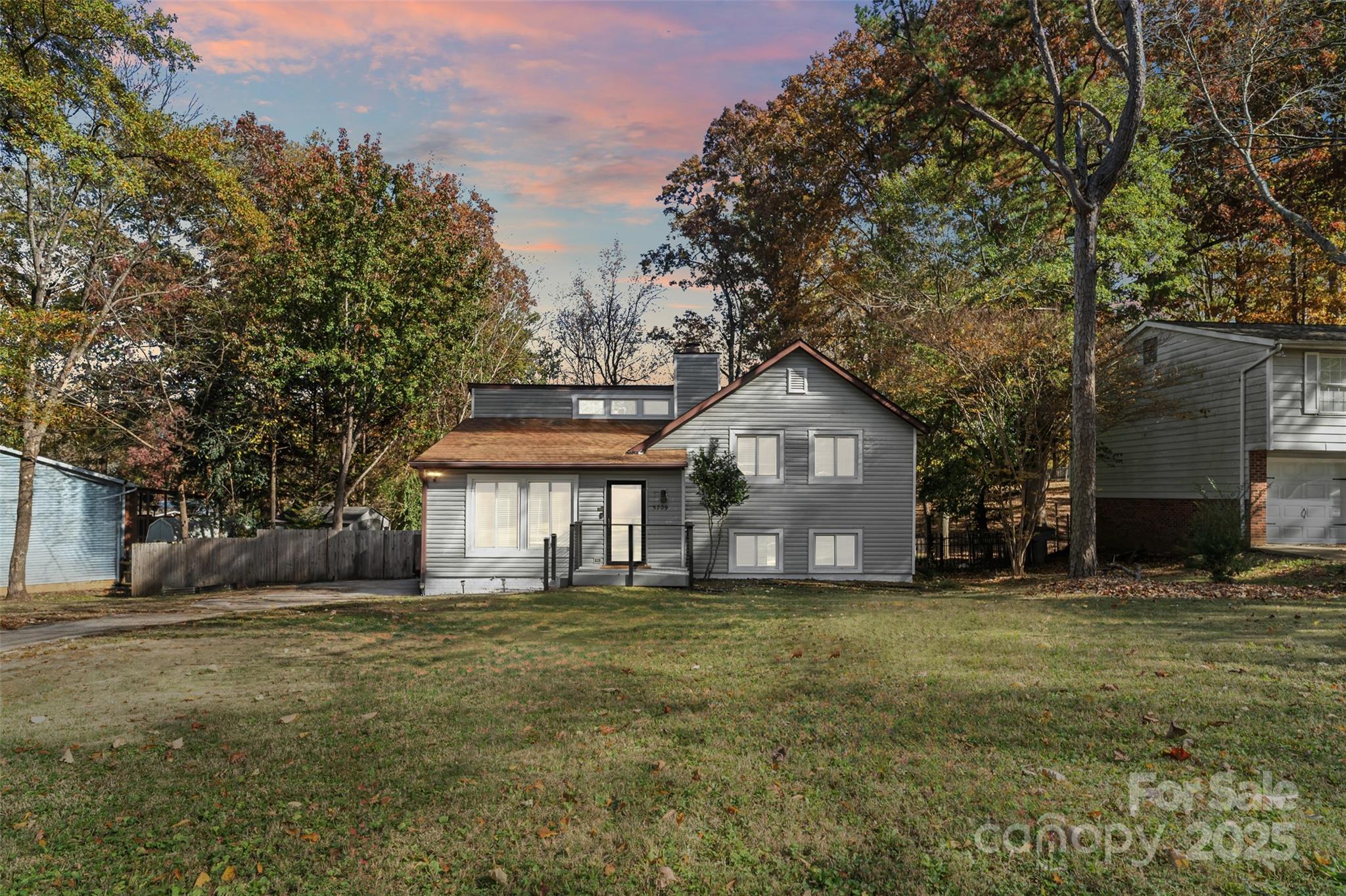 5709 Shadow Creek Road Charlotte, NC 28226 - Photo 2 of 39 a front view of a house with a yard