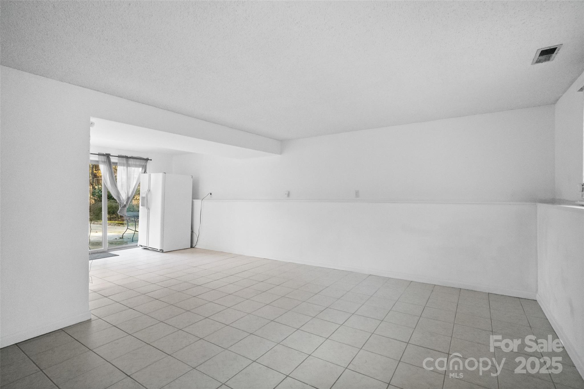 5709 Shadow Creek Road Charlotte, NC 28226 - Photo 22 of 39 a view of an empty room and window