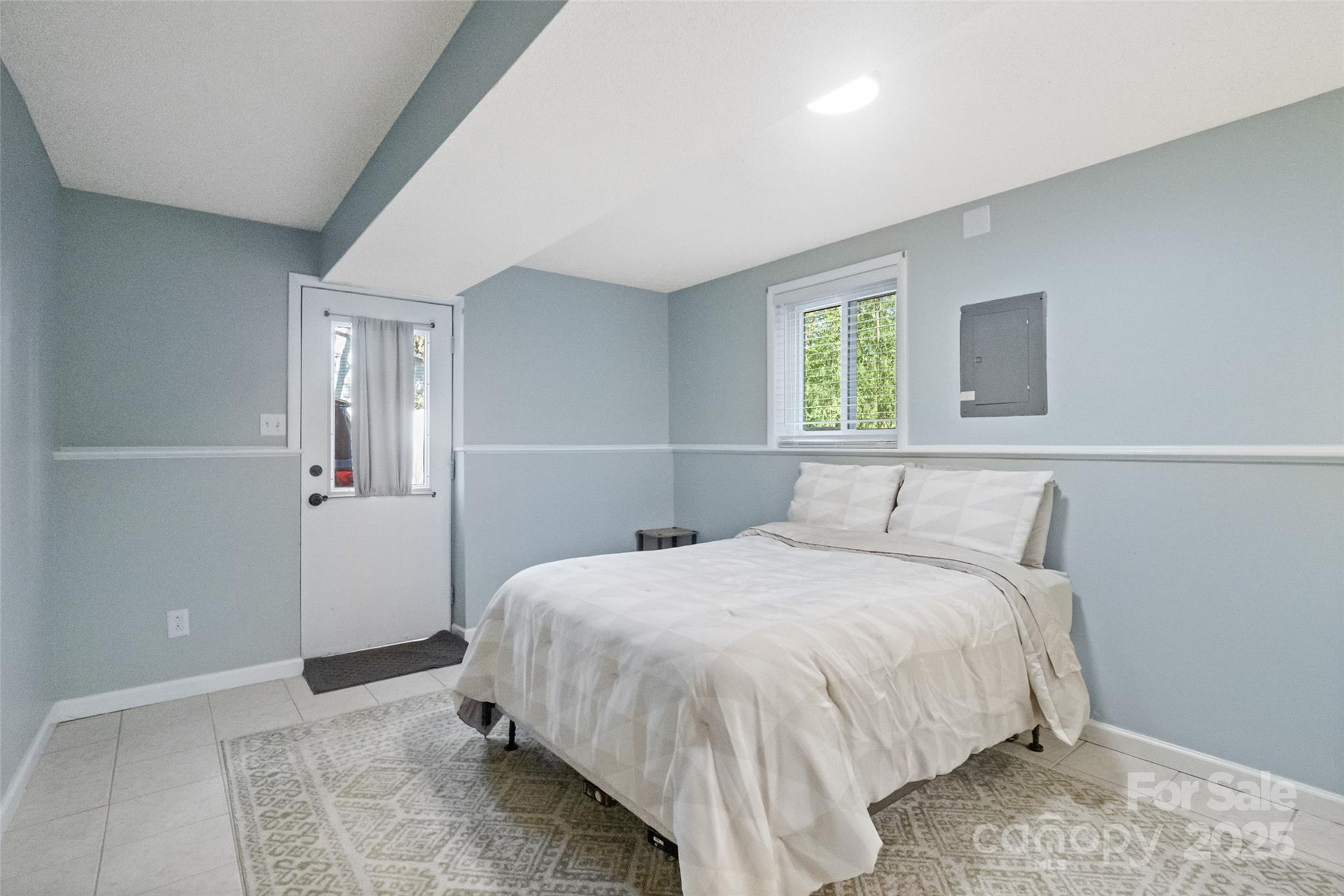 5709 Shadow Creek Road Charlotte, NC 28226 - Photo 27 of 39 a bedroom with a bed and a window