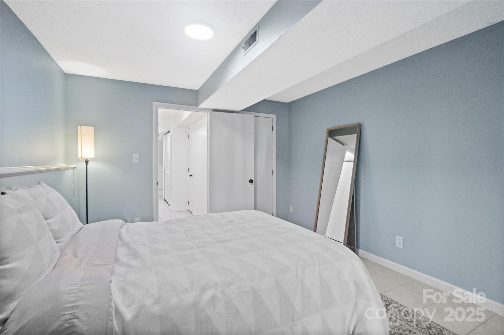 5709 Shadow Creek Road Charlotte, NC 28226 - Photo 28 of 39 a large white bed in a white room