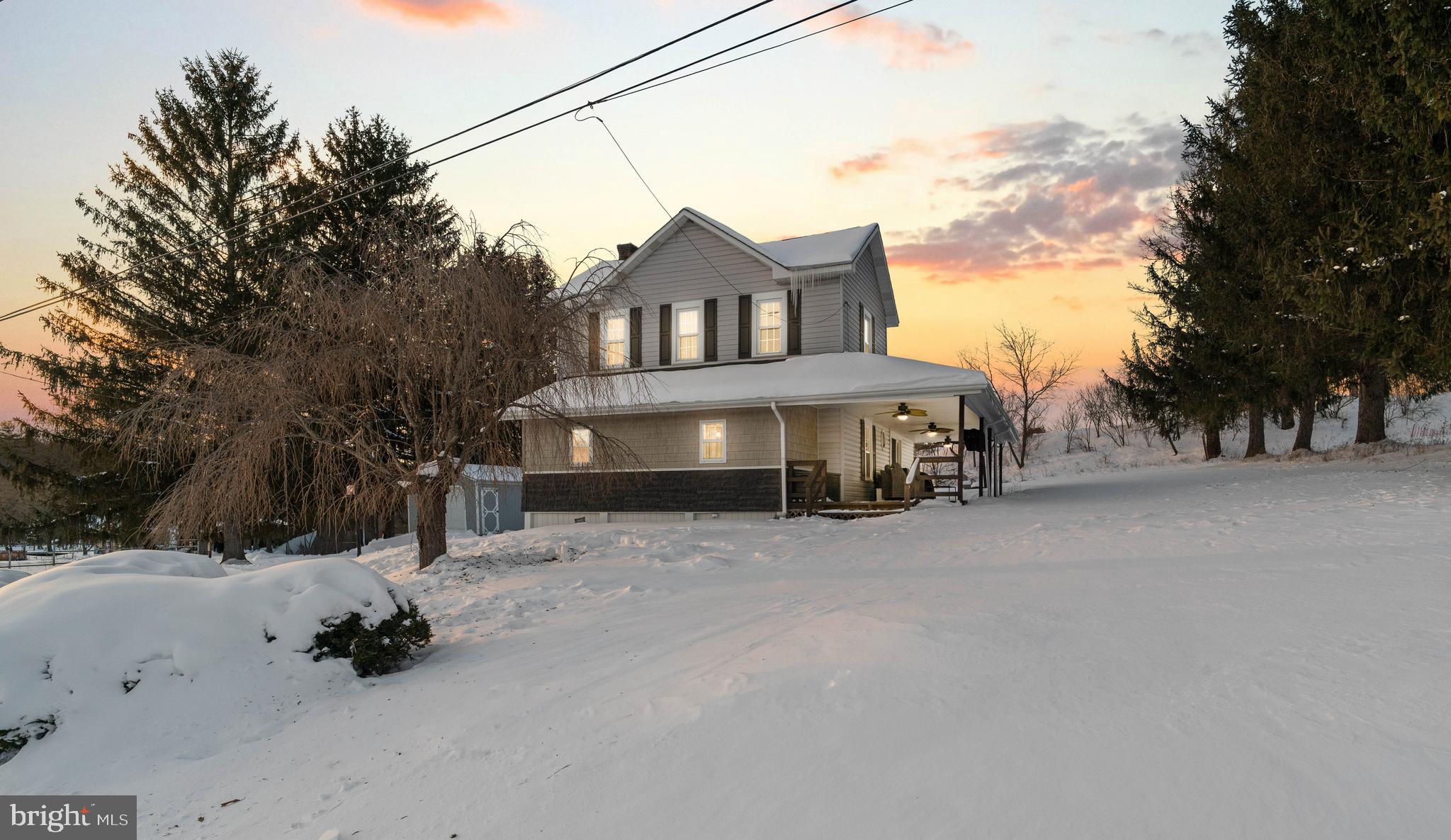 197 Ridge Street Smokerun, PA 16681 - Photo 1 of 47 a view of a house with a snow in the yard