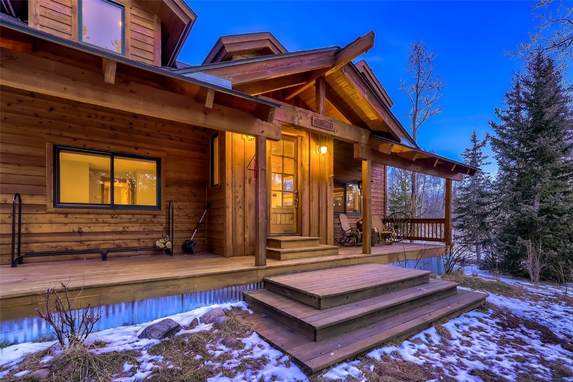 490 Adventure Road Alma, CO 80420 - Photo 1 of 28 Snow covered deck featuring covered porch