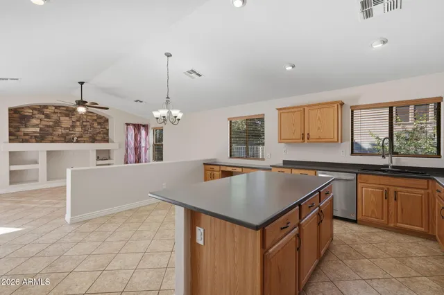 a living room with furniture fireplace and flat screen tv