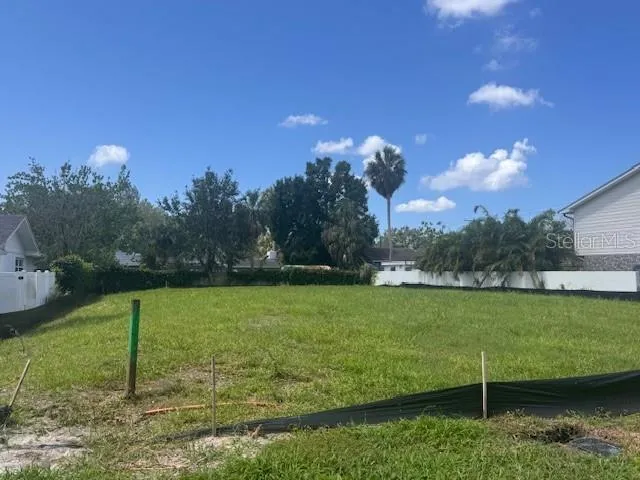 a view of a golf course with a lake