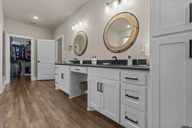 a white bath tub sitting in a bathroom