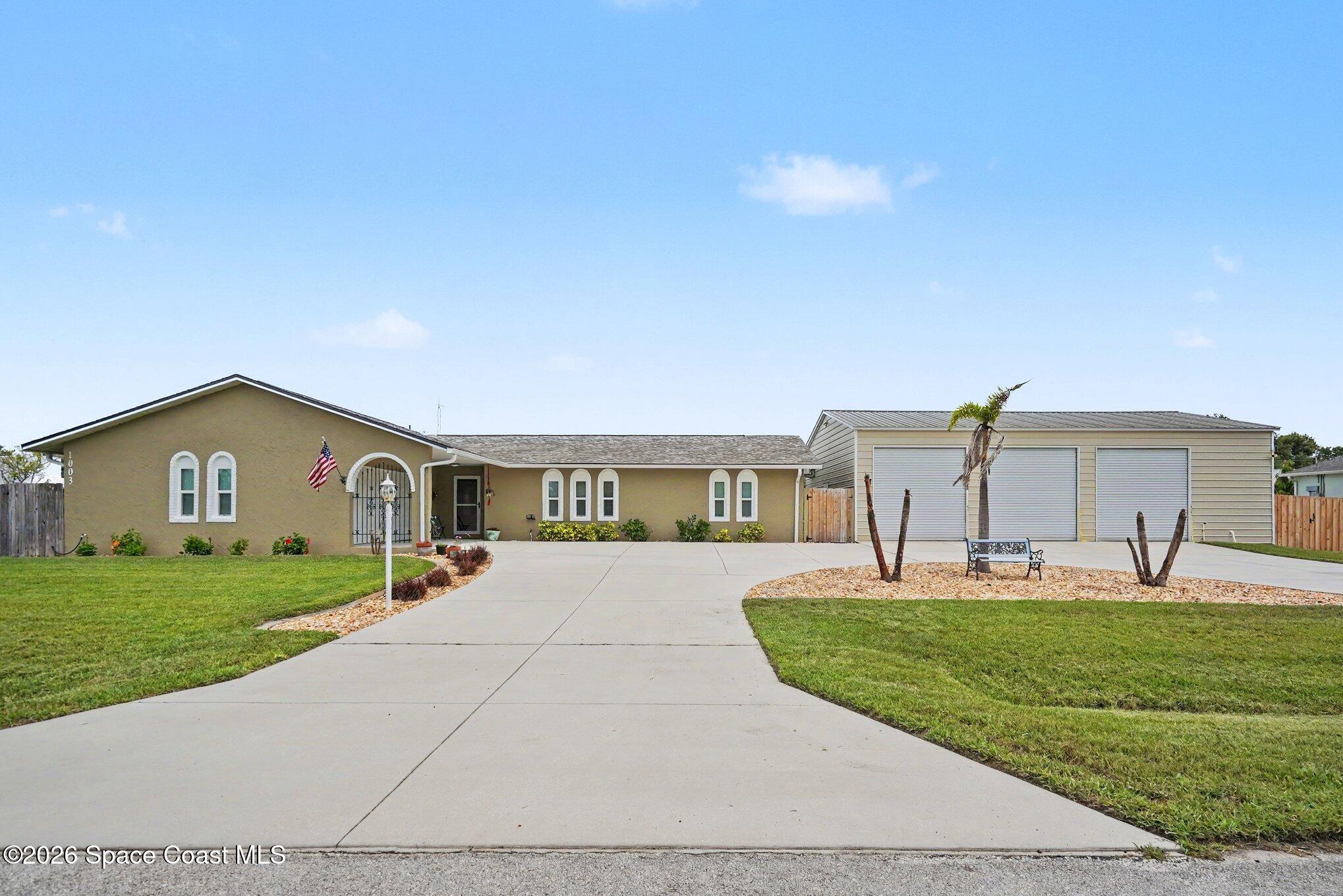 1003 Castile Road Southeast Palm Bay, FL 32909 - Photo 1 of 37 002_file_8833