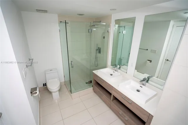 a bathroom with a bathtub and a sink