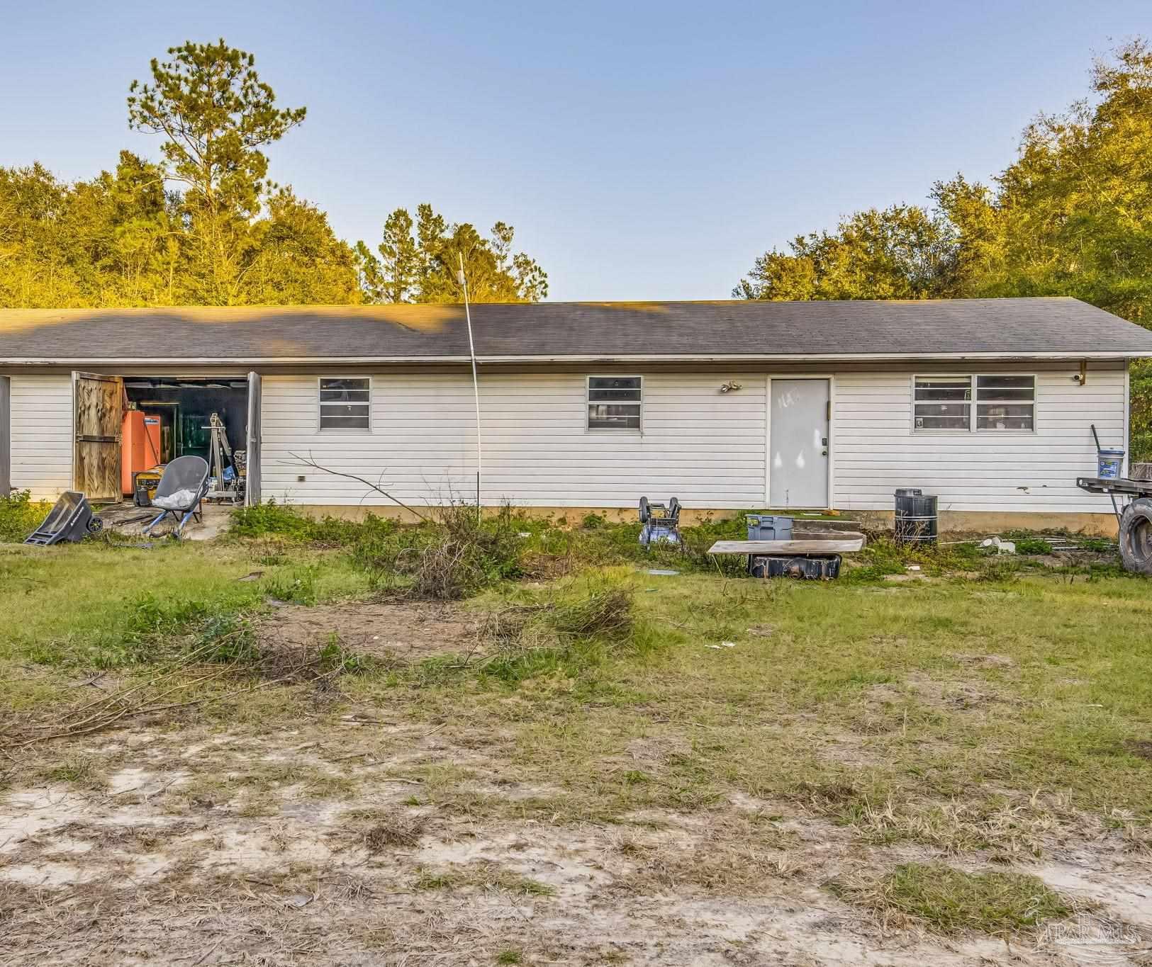 4616 B B Lowery Road Milton, FL 32583 - Photo 12 of 35 a front view of house with yard