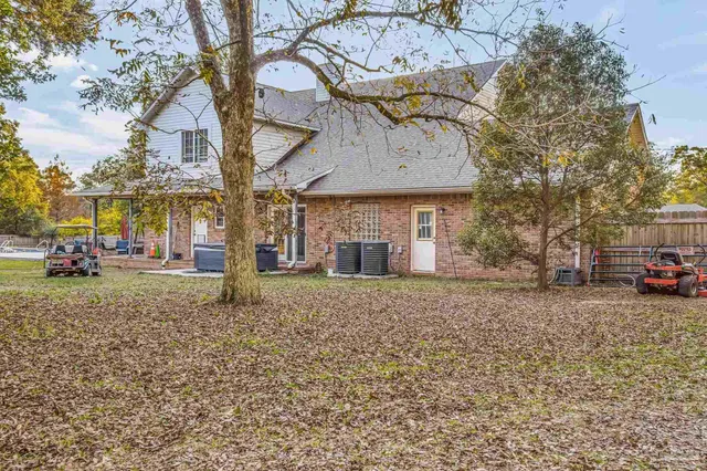 a house view with a outdoor space