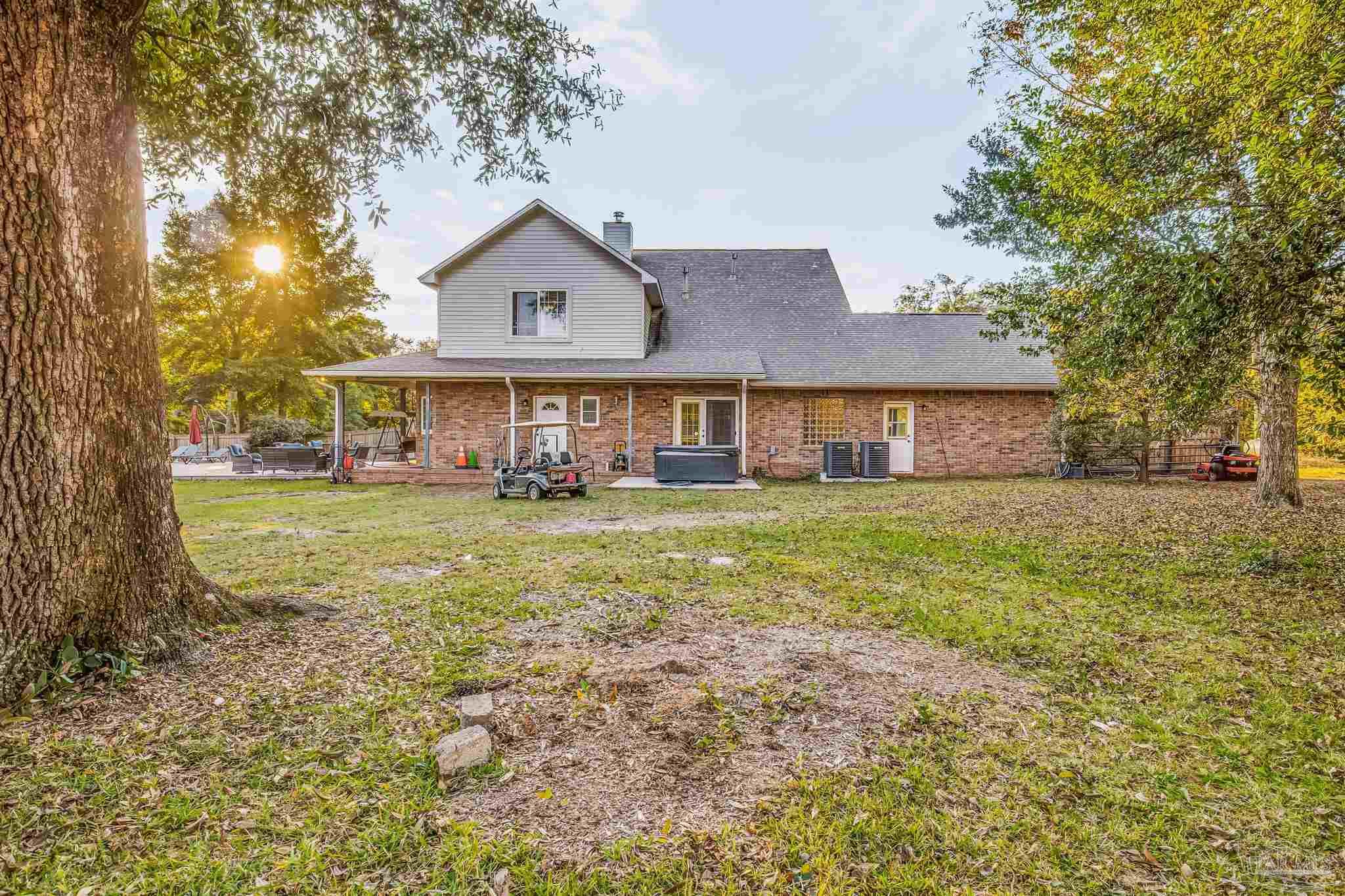 4616 B B Lowery Road Milton, FL 32583 - Photo 4 of 35 a front view of a house with garden