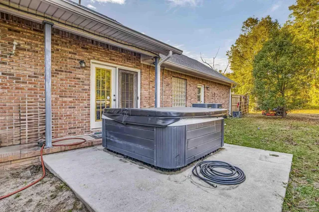 a view of backyard with outdoor seating