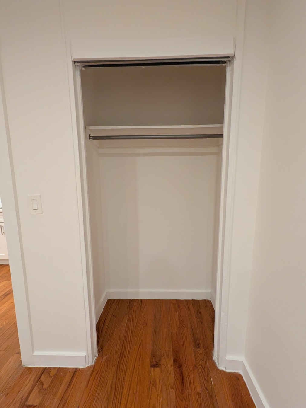 416 West 23rd Street, Unit 1A Manhattan, NY 10011 - Photo 8 of 9 a view of walk in closet with empty racks