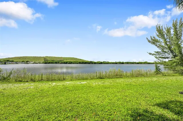 a view of a lake from a yard