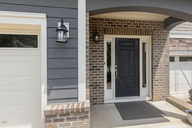 a front view of a house with a door