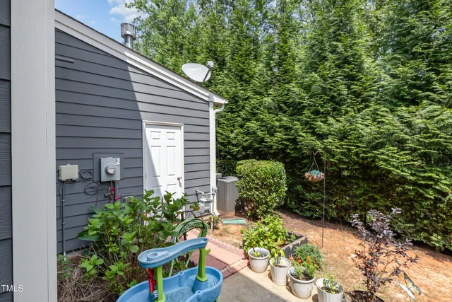 a backyard of a house with lots of green space