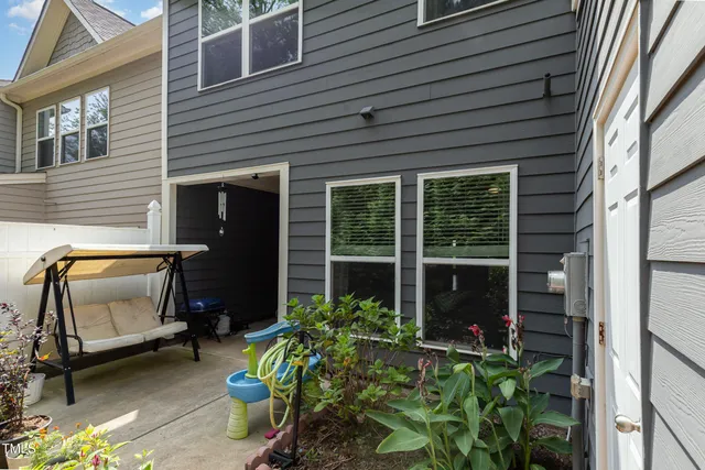 a view of house with chair and tables