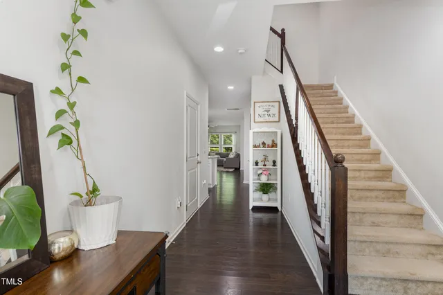 a view of entryway with wooden floor