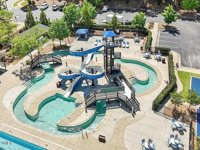 an aerial view of a kitchen dining space and hall view