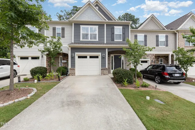 a house view with a garden space