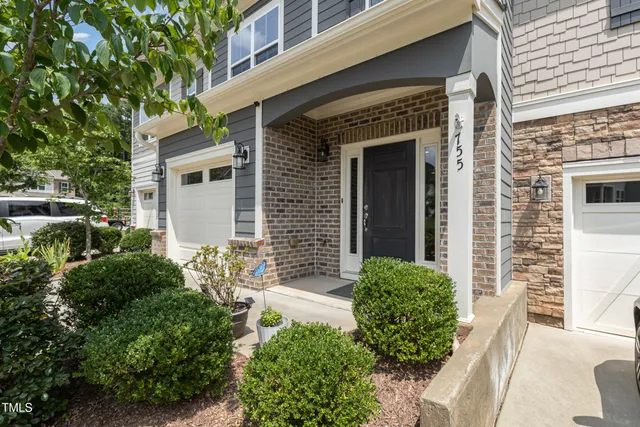 a view of a backyard of the house