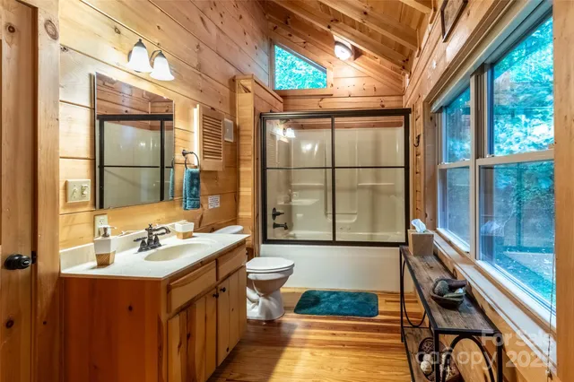 a view of a hallway with washer and dryer