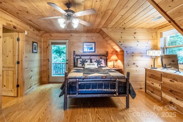 a living room with furniture flat screen tv and a fireplace