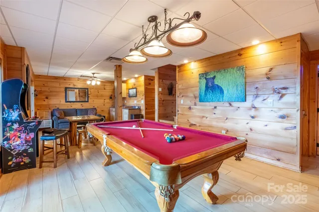 a living room with granite countertop furniture and a fireplace
