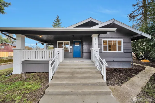 a front view of a house with a porch