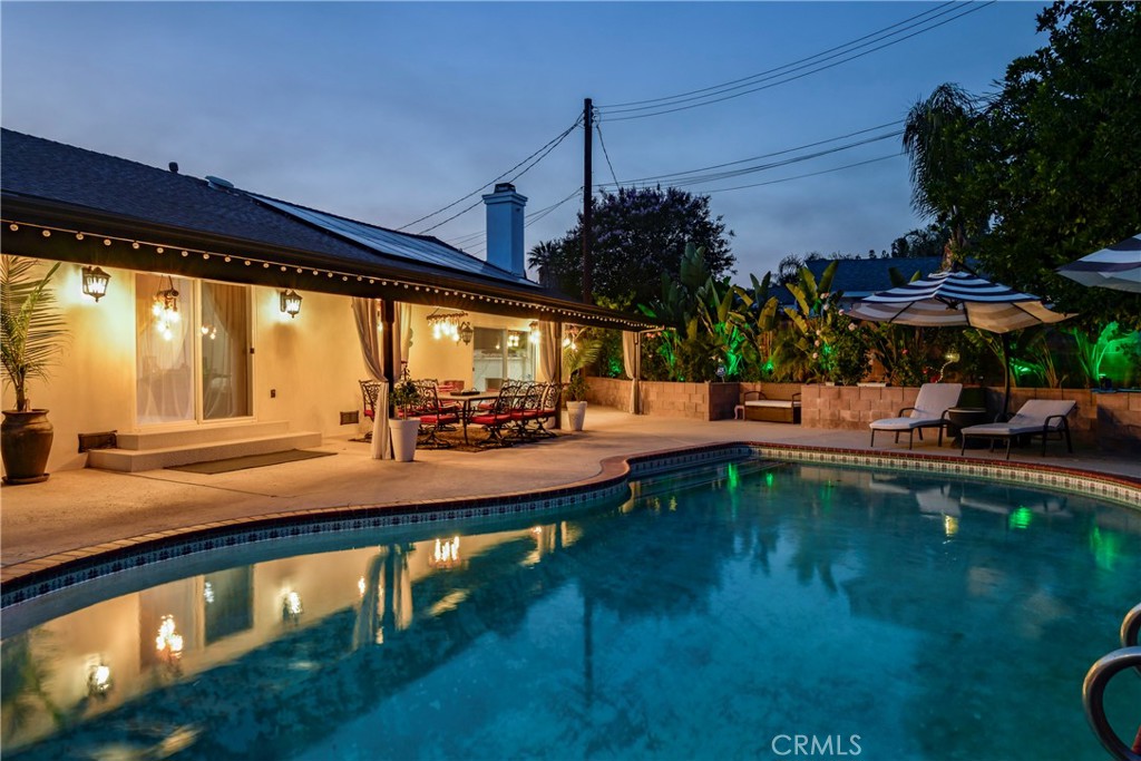 9728 Rhea Avenue Northridge, CA 91324 - Photo 34 of 36 a view of swimming pool with chairs in patio