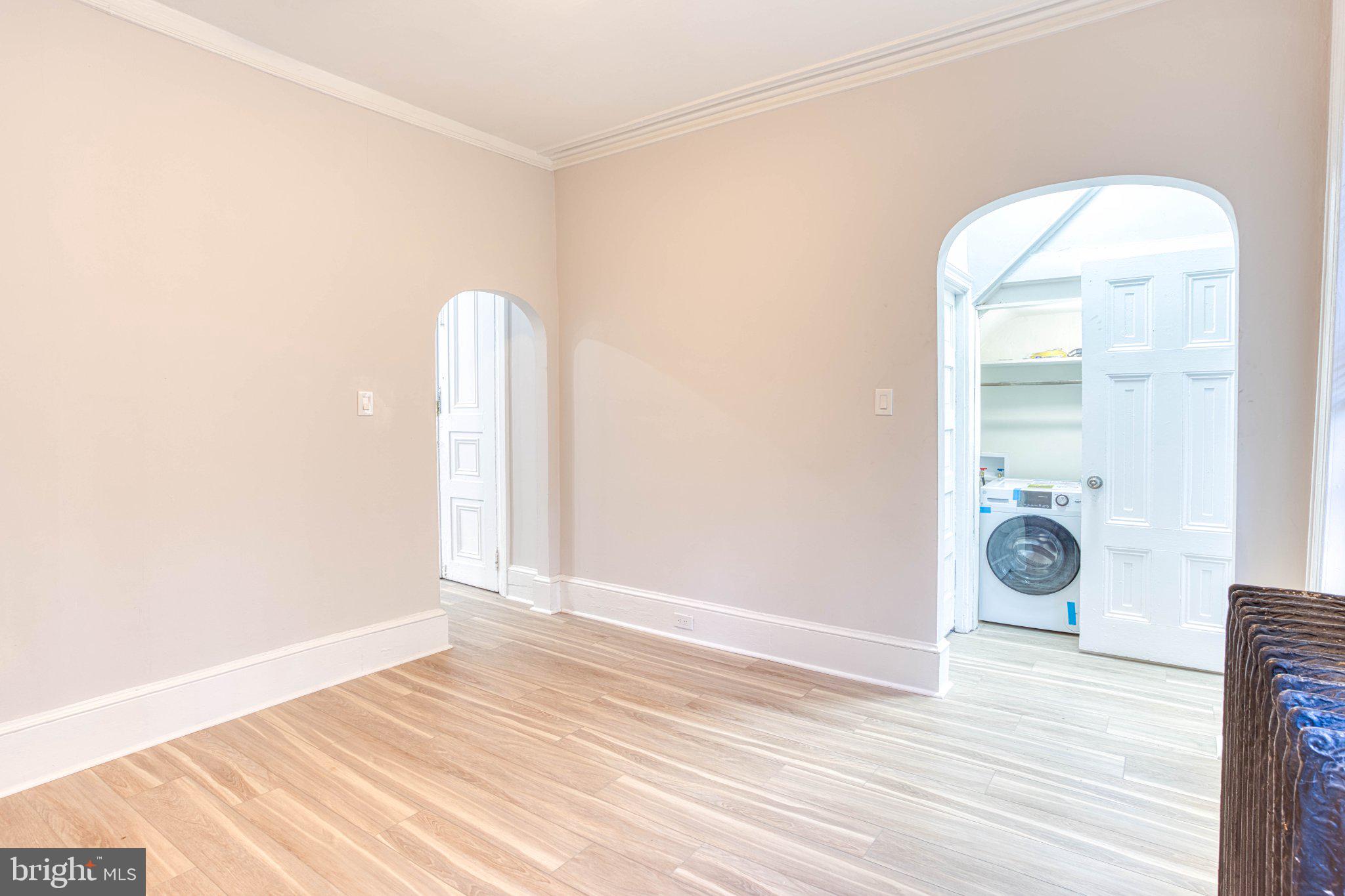 307 Kings Highway East, Unit 2 Haddonfield, NJ 08033 - Photo 17 of 21 a view of a livingroom with wooden floor and a window