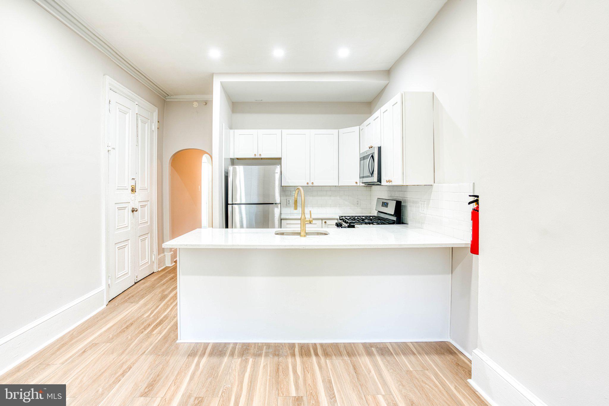 307 Kings Highway East, Unit 2 Haddonfield, NJ 08033 - Photo 10 of 21 a view of kitchen with wooden floor