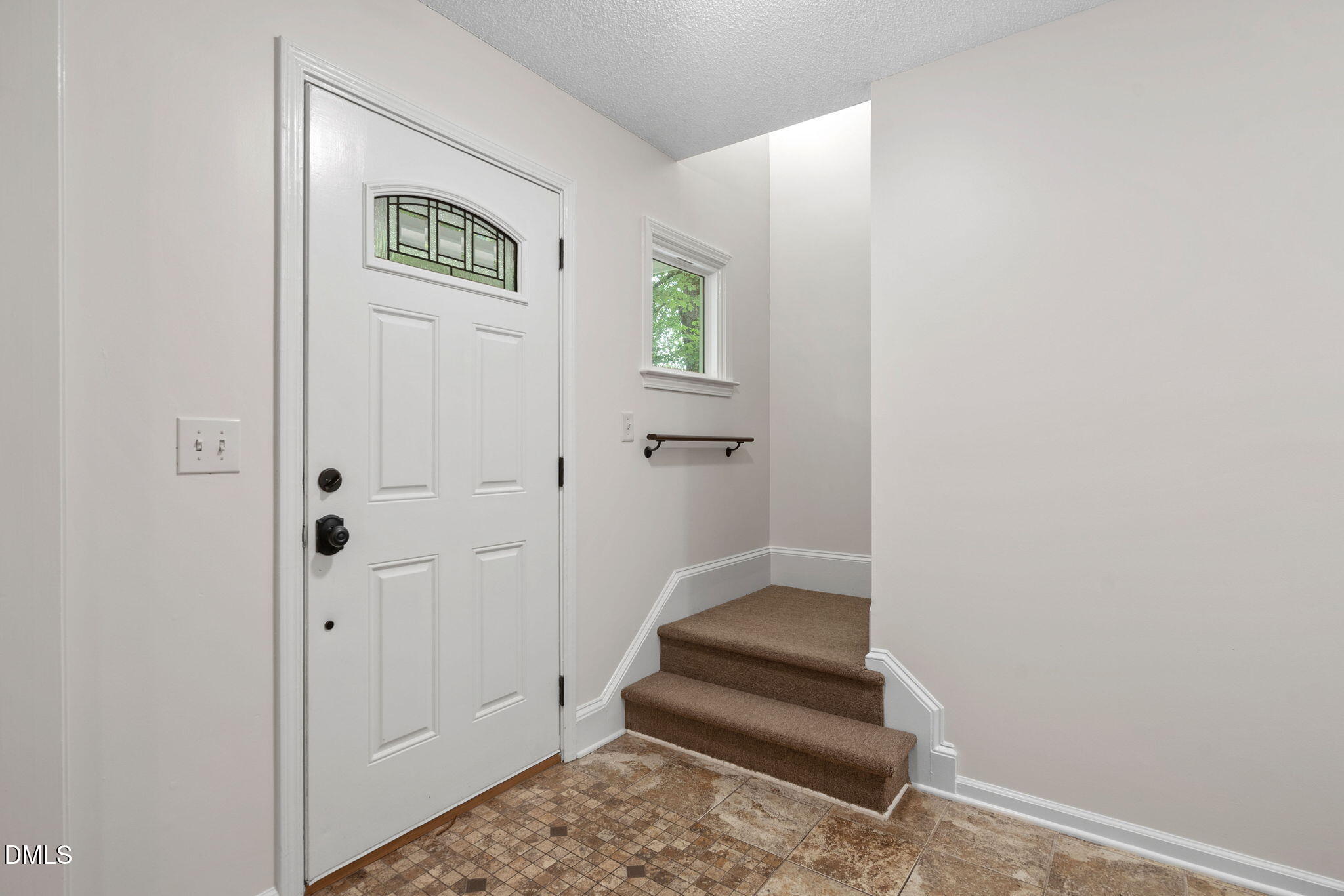 2724 Glastonbury Road Apex, NC 27539 - Photo 11 of 50 a view of entryway with wooden floor