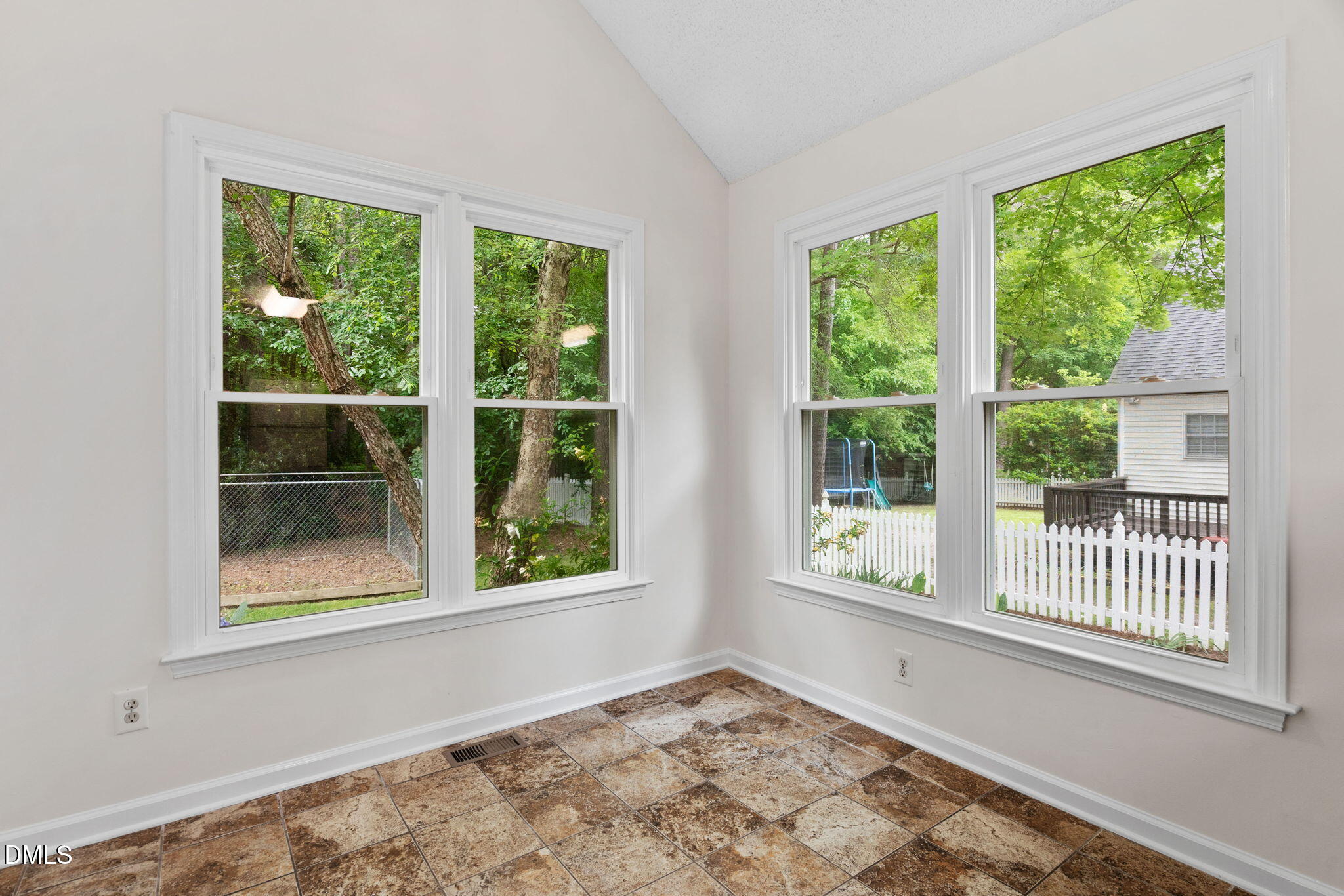 2724 Glastonbury Road Apex, NC 27539 - Photo 20 of 50 a view of an empty room with a window