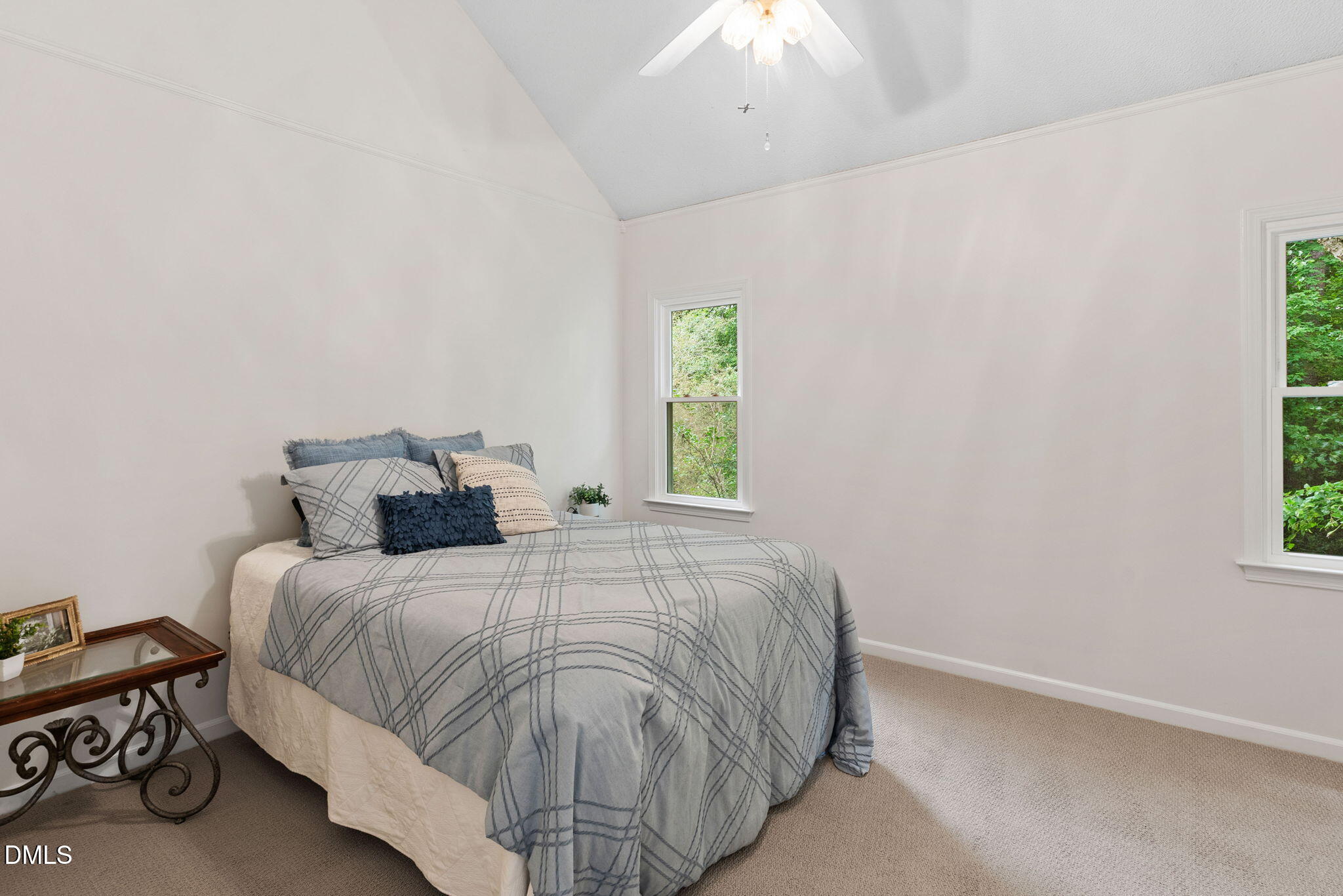 2724 Glastonbury Road Apex, NC 27539 - Photo 30 of 50 a bedroom with a bed and a window