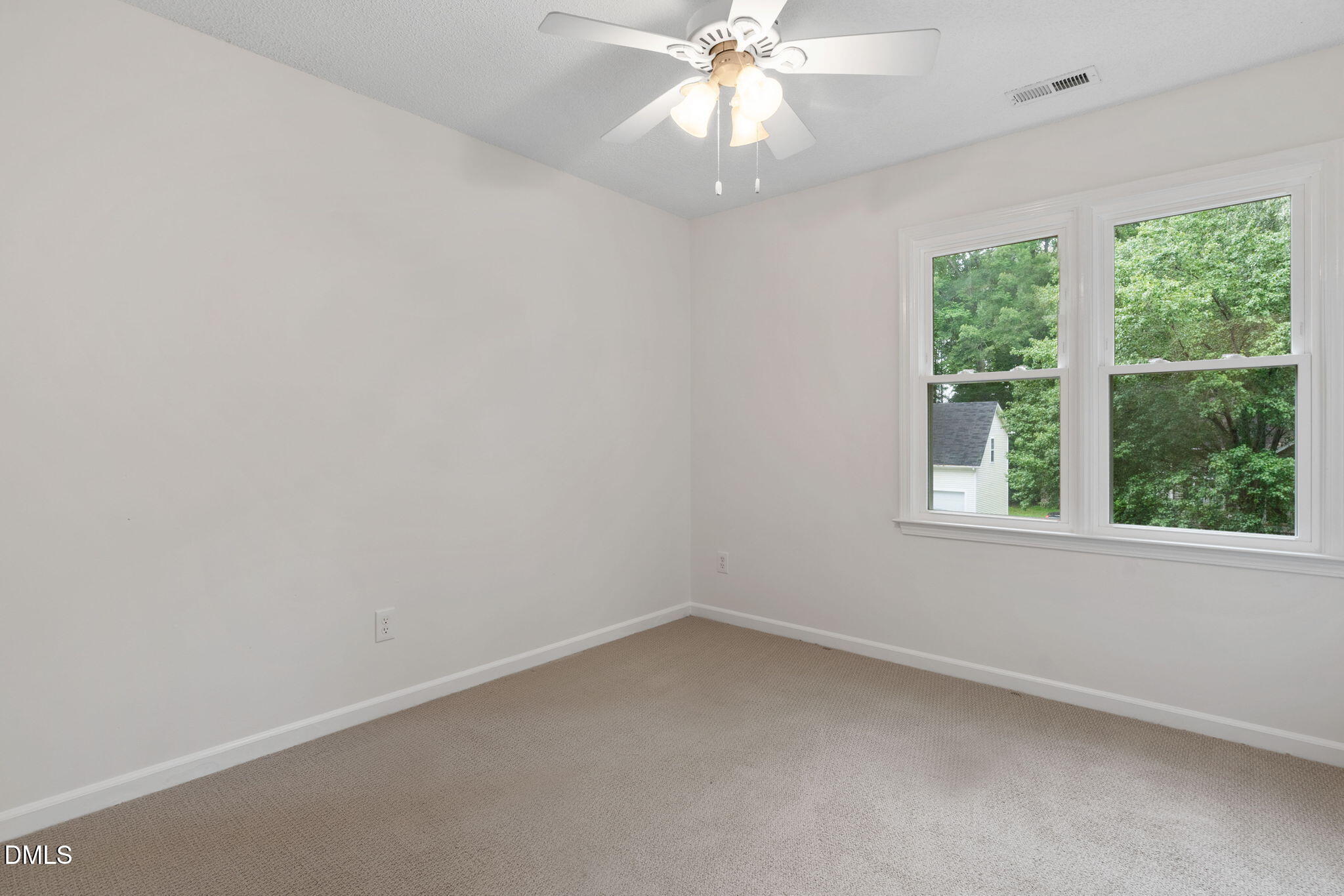2724 Glastonbury Road Apex, NC 27539 - Photo 36 of 50 an empty room with a window