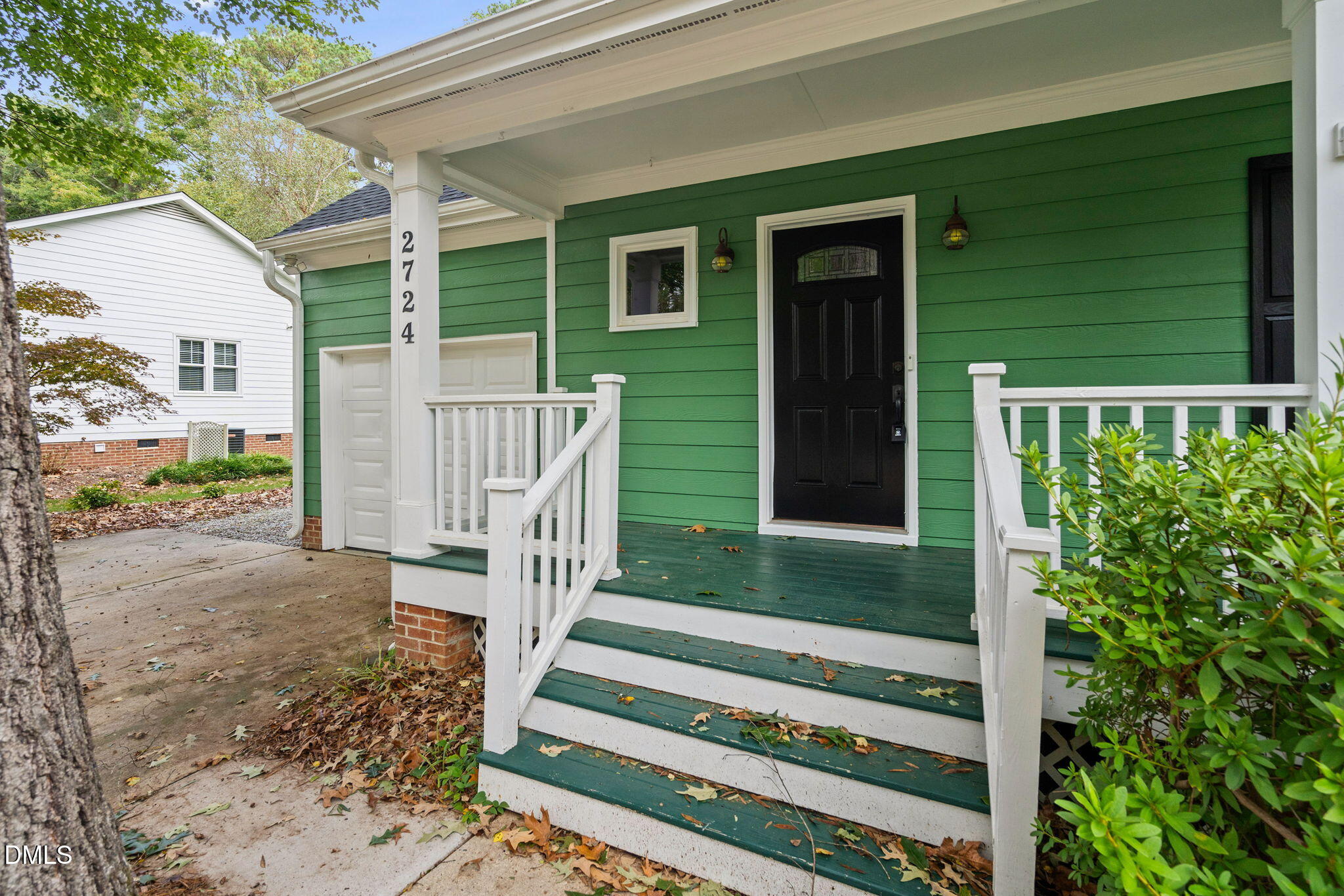2724 Glastonbury Road Apex, NC 27539 - Photo 7 of 50 a front view of a house with a porch