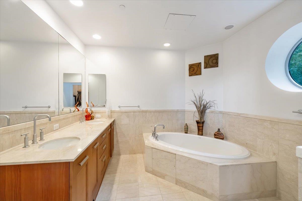 8100 River Road, Unit 209 North Bergen, NJ 07047 - Photo 11 of 42 a bathroom with a double vanity sink mirror and bathtub
