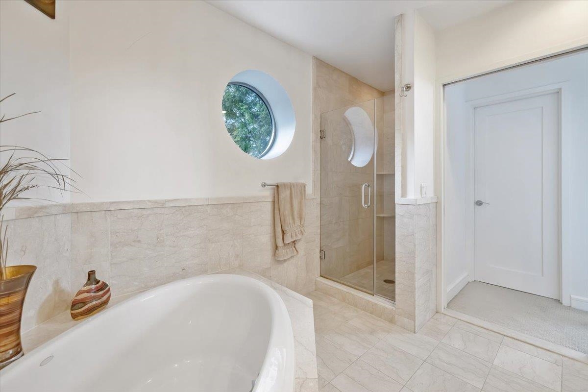 8100 River Road, Unit 209 North Bergen, NJ 07047 - Photo 12 of 42 a bathroom with a tub and a shower