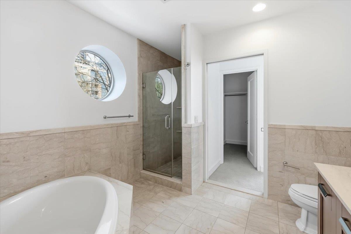 8100 River Road, Unit 209 North Bergen, NJ 07047 - Photo 25 of 42 a bathroom with a bathtub and a shower