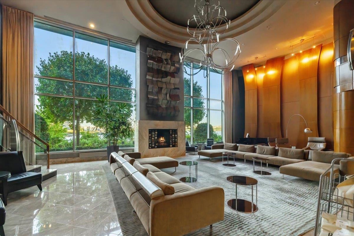 8100 River Road, Unit 209 North Bergen, NJ 07047 - Photo 31 of 42 a building outdoor space with patio furniture and a fireplace