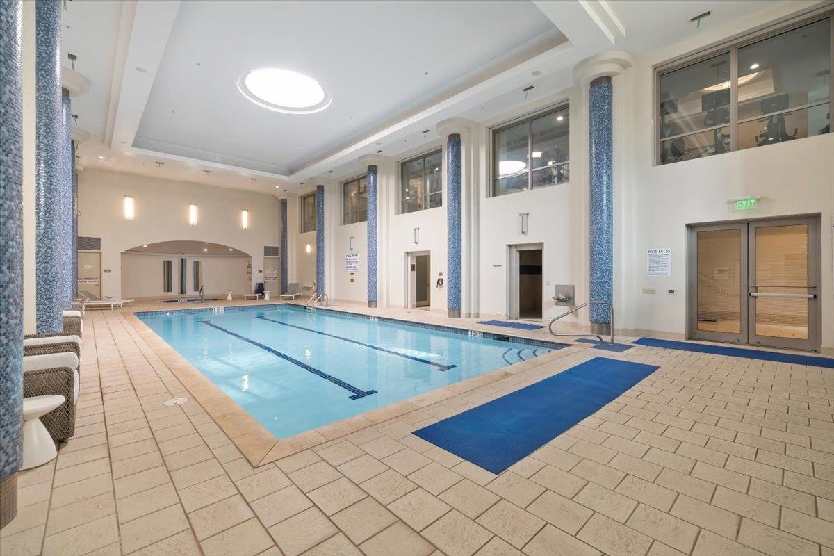 8100 River Road, Unit 209 North Bergen, NJ 07047 - Photo 34 of 42 a spacious bathroom with a tub and mirrors