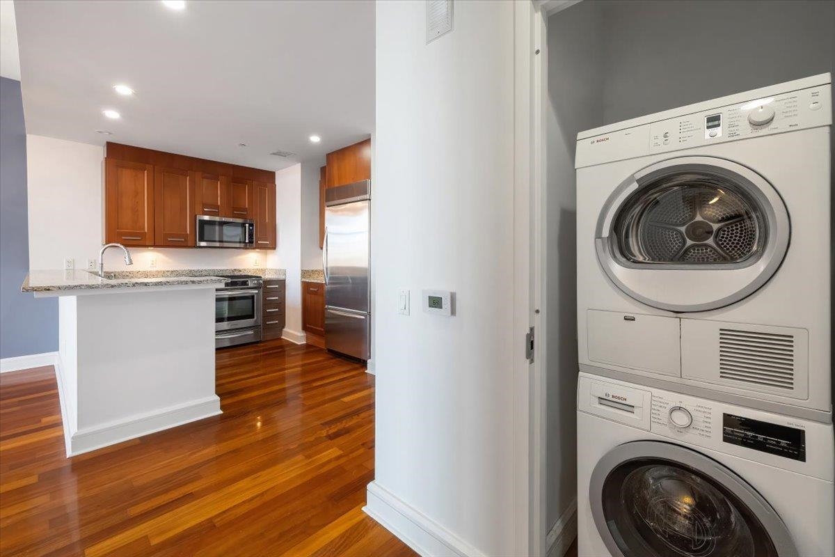 8100 River Road, Unit 209 North Bergen, NJ 07047 - Photo 5 of 42 a view of kitchen with sink and refrigerator