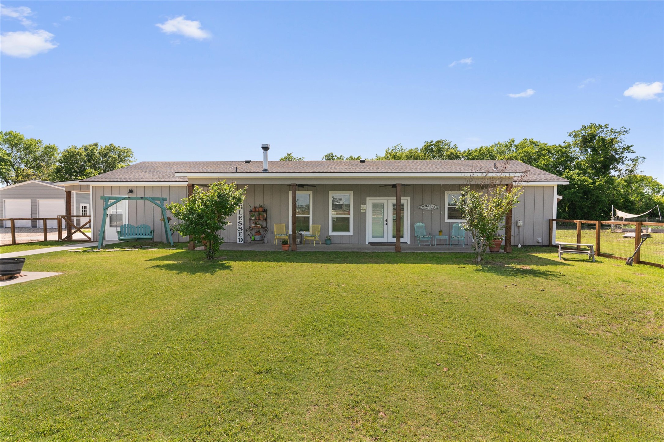 4651 Fm 972 Georgetown, TX 78626 - Photo 24 of 40 a front view of house with yard and outdoor seating