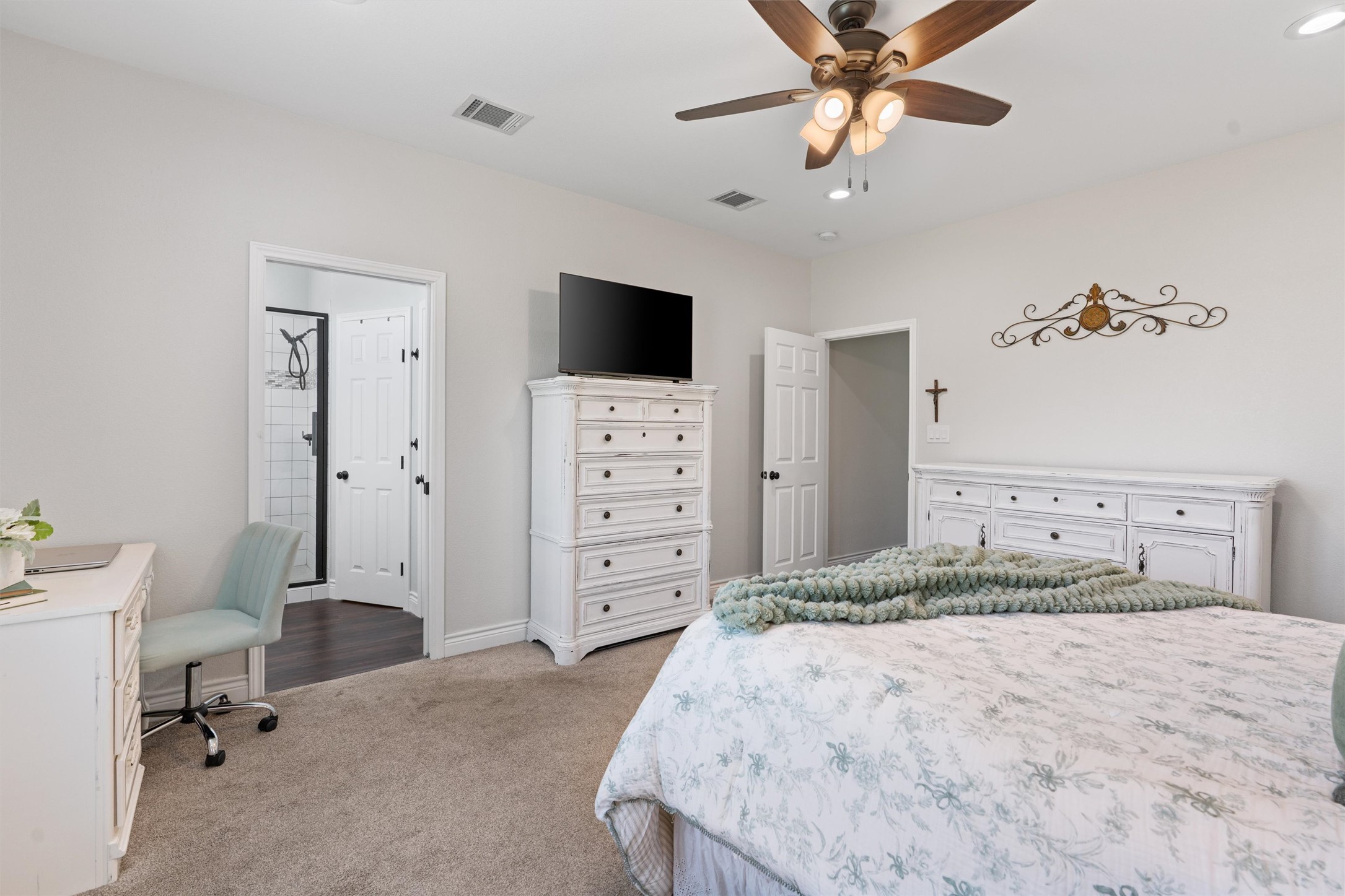 4651 Fm 972 Georgetown, TX 78626 - Photo 30 of 40 a bedroom with a bed and a chandelier